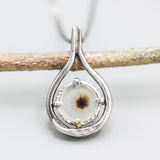 A garden Dendritic quartz pendant necklace in sterling silver bezel and prongs setting with silver vine design on sterling silver chain
