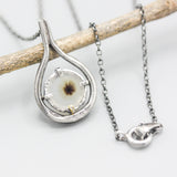 A garden Dendritic quartz pendant necklace in sterling silver bezel and prongs setting with silver vine design on sterling silver chain