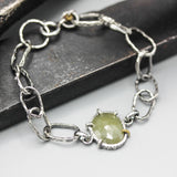 Bracelet oval faceted gray sapphire and Ruby decoration with hoop hard texture oxidized sterling silver chain