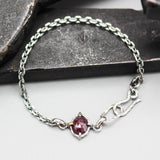 Bracelet Tiny faceted red ruby in silver bezel and prongs setting with sterling silver oxidized chain