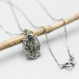Marquise Moss agate pendant necklace in silver bezel and prongs setting with sapphire on sterling silver chain