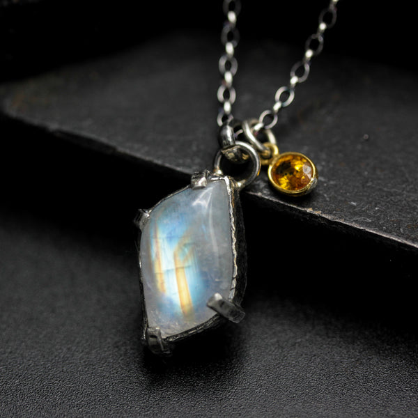 Rhombus shape Moonstone pendant necklace in silver bezel and prongs setting with yellow multi-sapphire