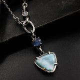 Triangle cabochon Larimar pendant necklace with blue kyanite and moonstone on oxidized sterling silver chain