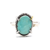 Oval turquoise ring in silver bezel and prongs setting with sterling silver oxidized hammer texture band