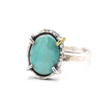 Oval turquoise ring in silver bezel and prongs setting with sterling silver oxidized hammer texture band