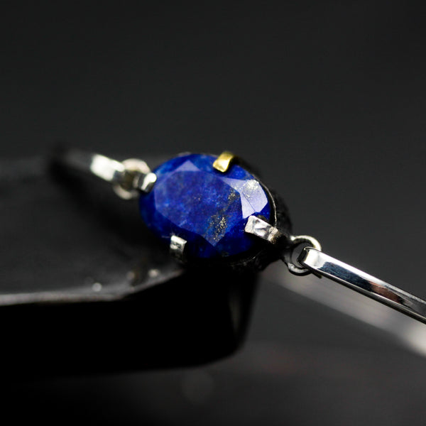 Oval Lapis Lazuli bangle bracelet in silver bezel and prongs setting with sterling silver band