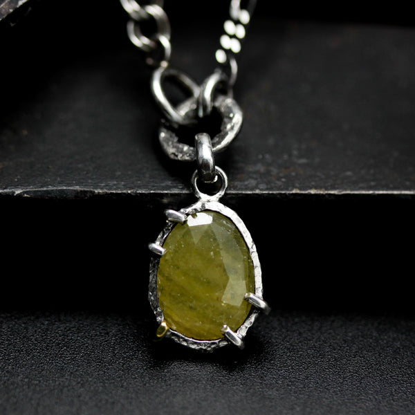 Yellow sapphire pendant necklace in silver bezel and prongs setting with oxidized sterling silver chain
