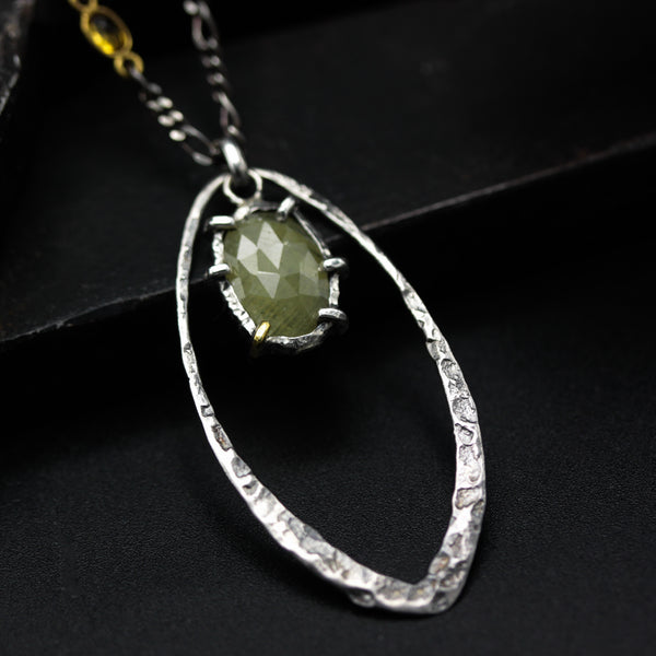 Oval Sapphire pendant necklace in silver bezel and prongs setting with silver marquise loop on sterling silver chain