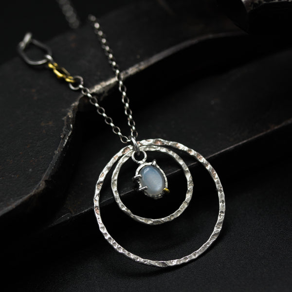 Moonstone pendant necklace and double circle shape with multi sapphire secondary on sterling silver chain