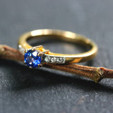 Wedding rings, round faceted Blue sapphire and diamonds with 22k gold band
