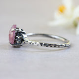 Ruby ring with moonstone side set gems in prongs setting with sterling silver oxidized texture band