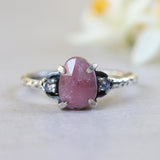 Ruby ring with moonstone side set gems in prongs setting with sterling silver oxidized texture band