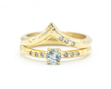 Set of 2 Round blue topaz  ring in prongs setting with diamond on 14k gold band set with 14k gold band ring with tiny 3 diamond on the side