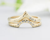Set of 2 14k gold with line texture band ring and tiny 7 diamond on the center set with 14k gold wood texture band ring and tiny 3 diamond