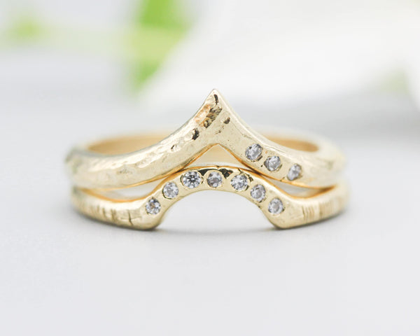Set of 2 14k gold with line texture band ring and tiny 7 diamond on the center set with 14k gold wood texture band ring and tiny 3 diamond