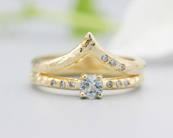 Set of 2 Round blue topaz  ring in prongs setting with diamond on 14k gold band set with 14k gold band ring with tiny 3 diamond on the side