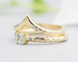 Set of 2 Round blue topaz  ring in prongs setting with diamond on 14k gold band set with 14k gold band ring with tiny 3 diamond on the side