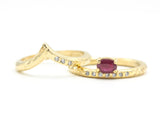 Set of 2 oval faceted ruby ring in prongs setting with diamond on 14k gold band set with 14k gold band ring with tiny 3 diamond on the side