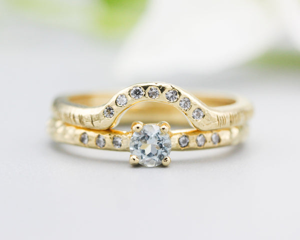 Set of 2 Round faceted blue topaz ring with tiny diamonds on 14k gold band set with 14k gold band ring with tiny 7 diamond on the center