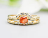 Set of 2 Oval cabochon Sunstone ring with tiny diamonds on 14k gold band set with 14k gold band ring with tiny 7 diamond on the center