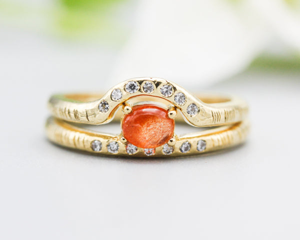 Set of 2 Oval cabochon Sunstone ring with tiny diamonds on 14k gold band set with 14k gold band ring with tiny 7 diamond on the center