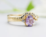 Set of 2 Oval faceted amethyst ring with tiny round diamonds side set with 14k gold band ring with tiny 7 diamond on the center