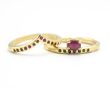 Set of 2 Oval faceted ruby ring in prongs setting with tiny black spinel on 14k gold band set with 14k gold band ring and tiny 15 ruby
