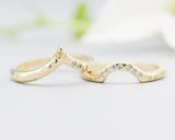 Set of 2 14k gold with line texture band ring and tiny 7 diamond on the center set with 14k gold wood texture band ring and tiny 3 diamond