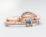 Set of 2 Round faceted blue topaz ring with tiny diamonds on 14k Rose gold band set with 14k rose gold ring with 7 diamond on the center