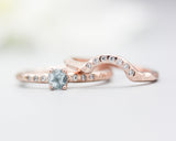 Set of 2 Round faceted blue topaz ring with tiny diamonds on 14k Rose gold band set with 14k rose gold ring with 7 diamond on the center