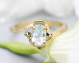 Oval Blue topaz ring and twin side set pyrite with 14k gold geometric texture band