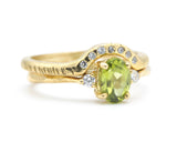 Set of 2 Oval faceted peridot ring with tiny round diamonds side set with 14k gold band ring with tiny 7 diamond on the center