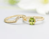 Set of 2 Oval faceted peridot ring with tiny round diamonds side set with 14k gold band ring with tiny 7 diamond on the center