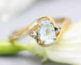 Oval Blue topaz ring and twin side set pyrite with 14k gold geometric texture band