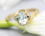 Oval Blue topaz ring and twin side set pyrite with 14k gold geometric texture band