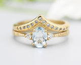 Set of 2 Oval Blue topaz ring and diamond side set in prongs setting with 14k gold band set with 14k gold band ring and tiny 15 diamond