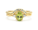 Set of 2 Oval faceted peridot ring with tiny round diamonds side set with 14k gold band ring with tiny 7 diamond on the center