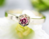 Round pink tourmaline ring in pave setting with 14k gold high polished flat band