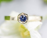 Blue sapphire ring in pave setting with 14k gold high polished flat band