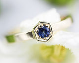Blue sapphire ring in pave setting with 14k gold high polished flat band