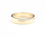 14k gold wedding ring 4 mm with diamond that extends half of the way around the high polished band