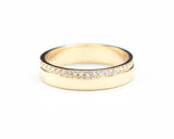 14k gold wedding ring 4 mm with diamond that extends half of the way around the high polished band