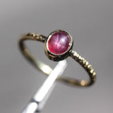 Natural star ruby ring in bezel settings with 18k gold texture band