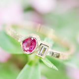 Teardrop ruby ring in bezel setting and rectangle diamond with 18k gold texture band