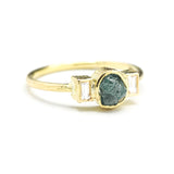 Rough diamond ring and twin side set diamonds with 18k gold texture band