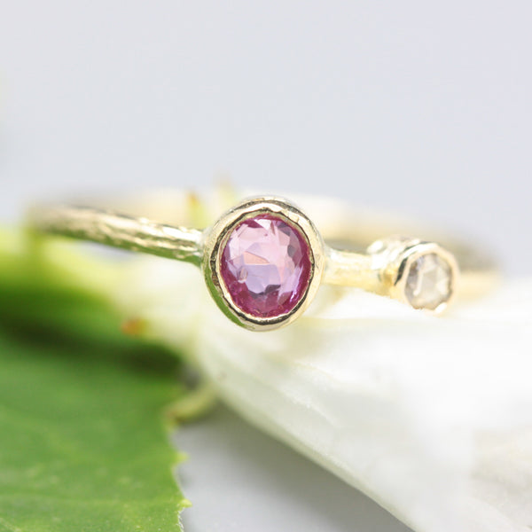 Oval ruby ring in bezel setting and tiny diamond with 18k gold texture band