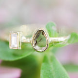 Teardrop diamond ring and rectangle diamond in bezel setting with 18k gold texture band