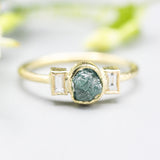 Rough diamond ring and twin side set diamonds with 18k gold texture band