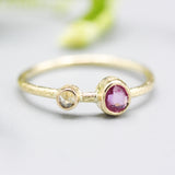 Oval ruby ring in bezel setting and tiny diamond with 18k gold texture band