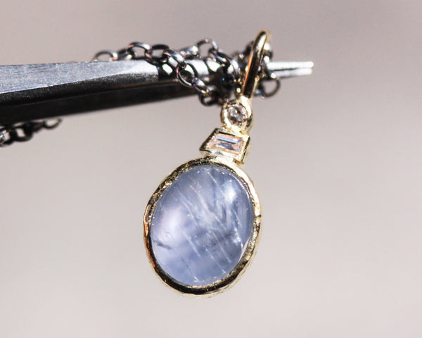 Blue star Sapphire, round diamond and Princess cut Diamond in 18k gold bezel settings with oxidized sterling silver chain